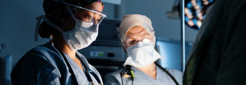 Two NorthShore anesthesiologists in operating room.